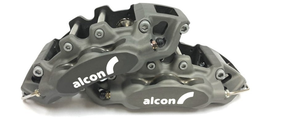 Representative six-piston anodized Alcon front calipers for the CR6420 Camaro Gen 6 race-kit application. Select left or right; one caliper supplied.